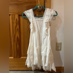 Super cute flowy white dress. Good condition!